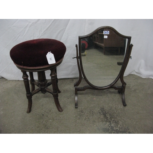 265 - Victorian walnut revolving piano seat having a circular padded seat and standing on turned splayed s... 
