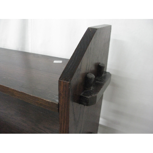 275 - Oak open bookshelves having six peg and hole shelves united by shaped end supports - 106cm x 27cm x ... 
