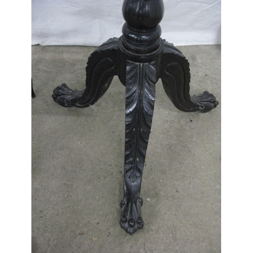 279 - Mahogany jardiniere/plantstand having a circular dish top raised on a turned column with three carve... 