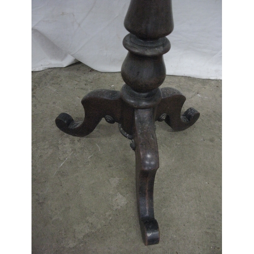 285 - Two mahogany wine tables both having circular tops over turned columns and standing on tripod bases ... 