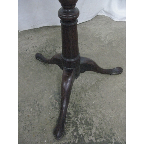 285 - Two mahogany wine tables both having circular tops over turned columns and standing on tripod bases ... 