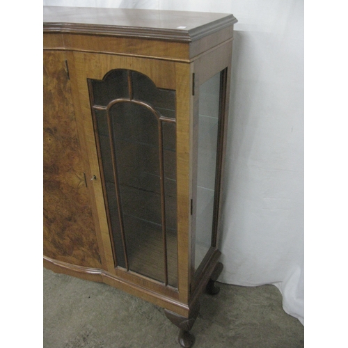 289 - Walnut display cabinet having a central bow front door, the door opening to two shelves, flanked by ... 