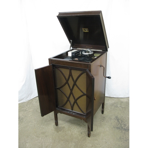 294 - His Master's Voice mahogany floor standing gramophone cabinet having a hinged lift top lid opening t... 