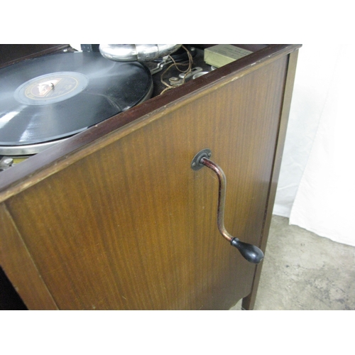 294 - His Master's Voice mahogany floor standing gramophone cabinet having a hinged lift top lid opening t... 
