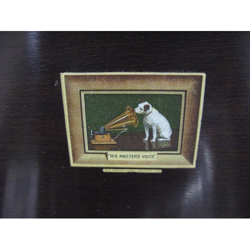 294 - His Master's Voice mahogany floor standing gramophone cabinet having a hinged lift top lid opening t... 