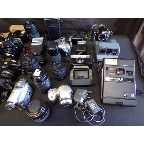 Large collection of cameras, lenses and camera bags etc to include ...