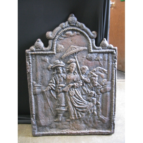110 - Cast iron fire back depicting a figural scene - 78cm x 55cm