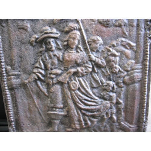 110 - Cast iron fire back depicting a figural scene - 78cm x 55cm