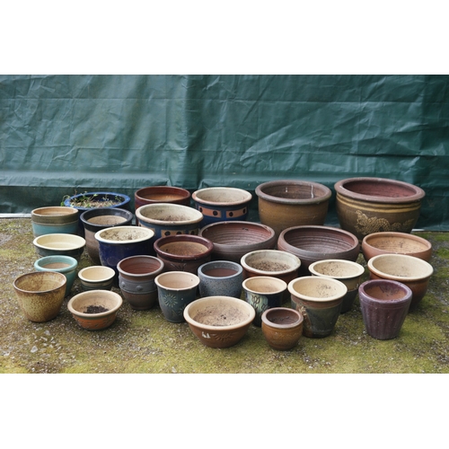88 - Collection of twenty nine various glazed garden plant pots - largest 52.5cm x 37cm tall