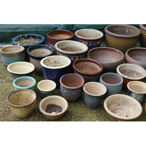 88 - Collection of twenty nine various glazed garden plant pots - largest 52.5cm x 37cm tall