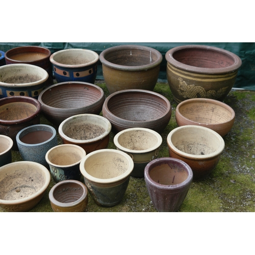 88 - Collection of twenty nine various glazed garden plant pots - largest 52.5cm x 37cm tall
