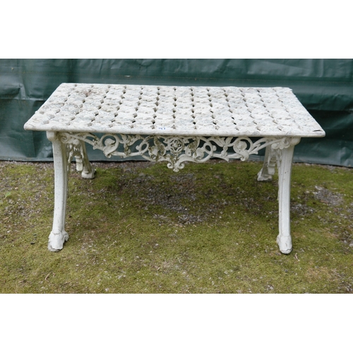 91 - White painted metal garden coffee table having pierced top and frieze, standing on swept legs - 83.5... 