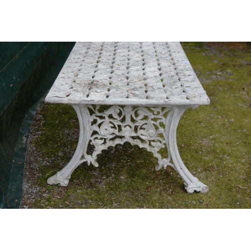 91 - White painted metal garden coffee table having pierced top and frieze, standing on swept legs - 83.5... 