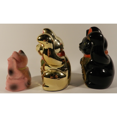 168 - Three porcelain Lucky cats apx 10cm, 15cm, 15.5cm height