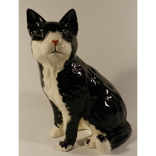 195 - Life size Black and white porcelain Cat statue apx 32cm height