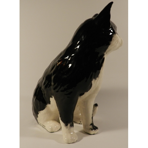 195 - Life size Black and white porcelain Cat statue apx 32cm height