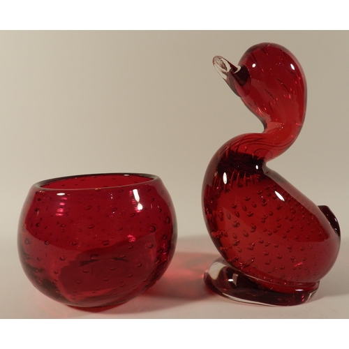 229 - Red glass duck paperweight and a red glass vase 