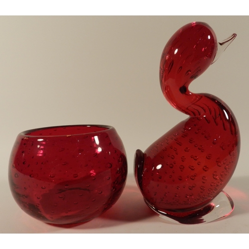 229 - Red glass duck paperweight and a red glass vase 