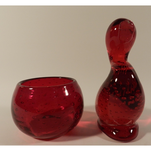 229 - Red glass duck paperweight and a red glass vase 