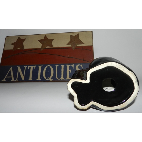 66 - Small black porcelain Cat statue with a Antique Sign apx 43cm x 23cm 