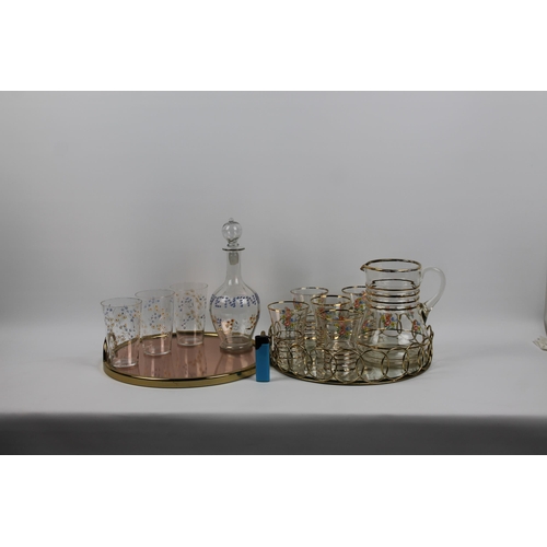 112 - Two Sets of Glass with Jug and Decanter, on Two Mirrored Trays, Mint Condition