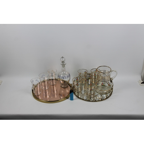 112 - Two Sets of Glass with Jug and Decanter, on Two Mirrored Trays, Mint Condition