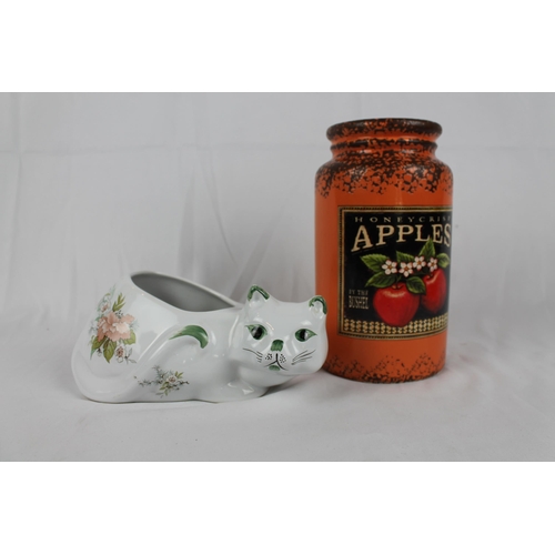 249 - Bairstow`s Manor Pottery Cat, 9'' x 4'' inches, ( 23 x 10cm ) with a Orange Porcelain Jar 9'' tall d... 