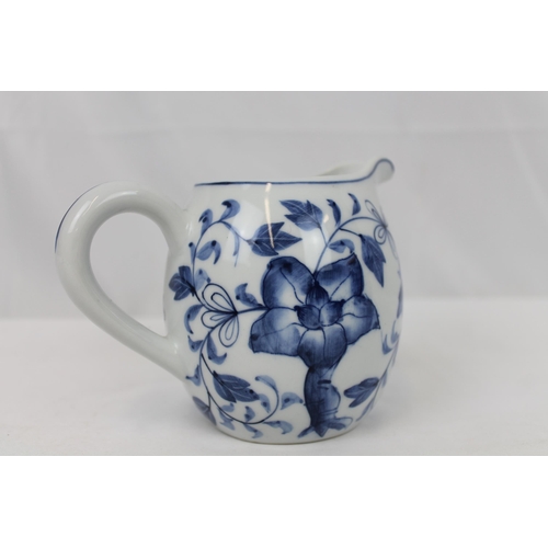 84 - Vintage Blue and White Floral Creamer , 10 cm tall