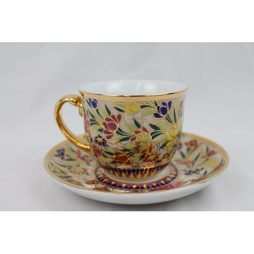 150 - Thailand hand Painted Porcelain Tea Cup and Saucer