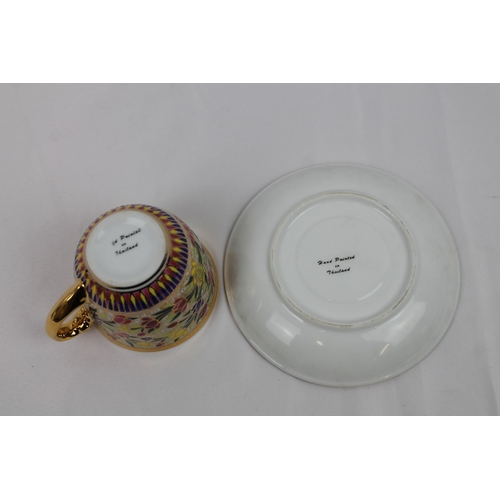 150 - Thailand hand Painted Porcelain Tea Cup and Saucer