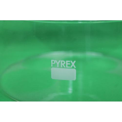 264 - Pyrex Large Glass Bowl , 9 cm tall and a 19 cm in diameter