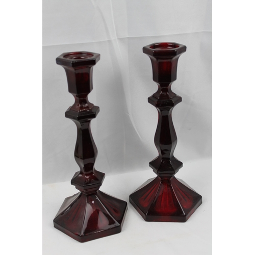 378 - Ruby Red Glass Candlesticks, mint condition, 24 cm tall