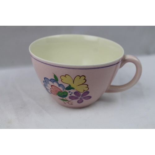 419 - Poole Pottery Tea Cup, 9.5 cm in diameter