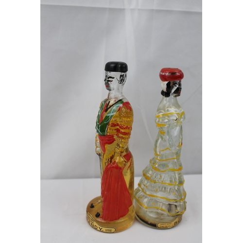 435 - Vintage Hand Painted Brandy Matador & Lady Bottles, 17 cm tall