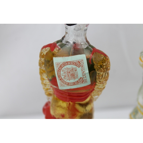 435 - Vintage Hand Painted Brandy Matador & Lady Bottles, 17 cm tall