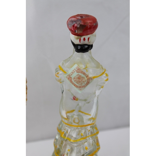 435 - Vintage Hand Painted Brandy Matador & Lady Bottles, 17 cm tall