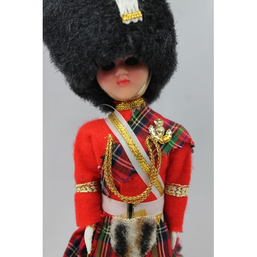 442 - Vintage Royal Guard Soldier Doll, 22 cm tall