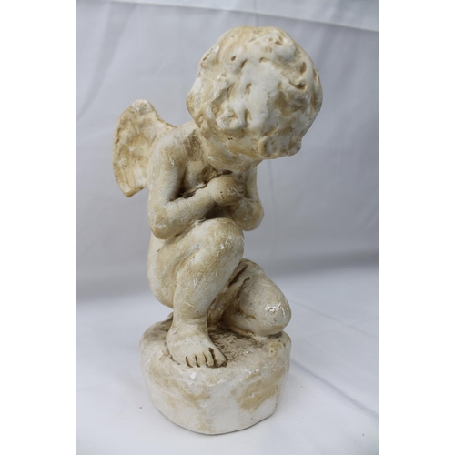 488 - Sophia Rosamund Praeger HRHA MA MBE , 1867 - 1954, The Cherub's Prayer Figure. Signed, 18 cm tall