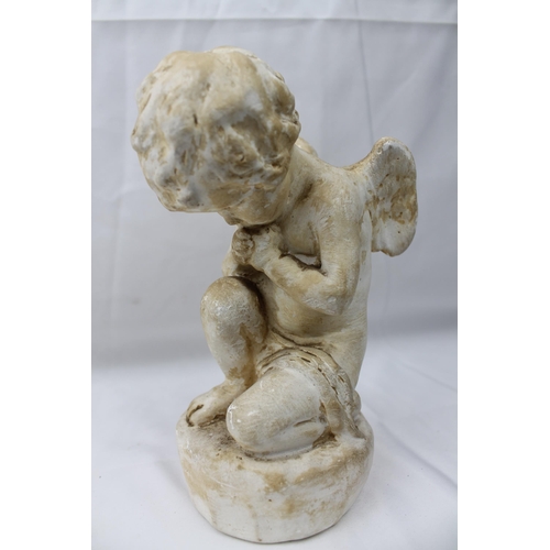 488 - Sophia Rosamund Praeger HRHA MA MBE , 1867 - 1954, The Cherub's Prayer Figure. Signed, 18 cm tall