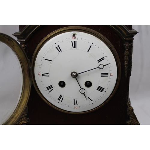 492 - Antique French Mahogany Mantel Clock With Ormolu Mounts And Finials, with Key, / left site small gla... 