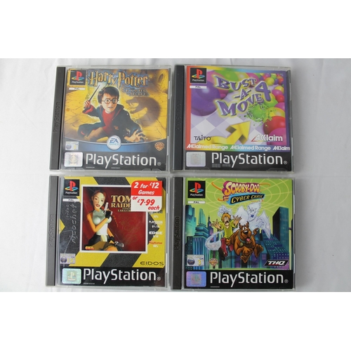 11 - Play Station 1, Four Games, Harry Potter And The Chamber of Secret, Bust a Move 4, Scooby Doo And Th... 