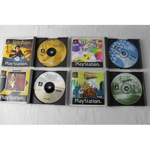 11 - Play Station 1, Four Games, Harry Potter And The Chamber of Secret, Bust a Move 4, Scooby Doo And Th... 