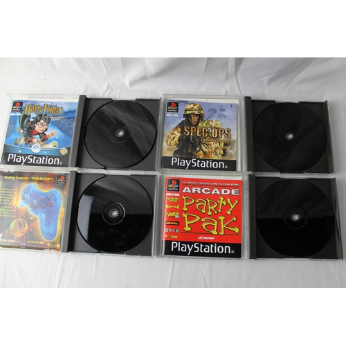 12 - Play Station 1, Four Games, Pac-Man, Harry Potter And The Philosophers Stone, Specops - Airborne Com... 