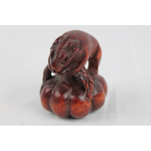 13 - Netsuke
Japanese Carved Wooden Netsuke Comprising Model of a Mouse 4.5 x 5.5cm