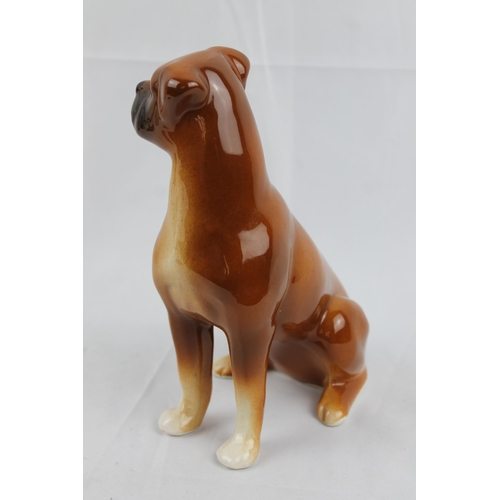 19 - Boxer Dog
A Ceramic Boxer Dog Figurine  Tan Colour Sitting On Haunches 20.5cm height