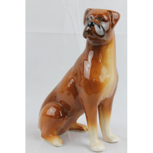 19 - Boxer Dog
A Ceramic Boxer Dog Figurine  Tan Colour Sitting On Haunches 20.5cm height