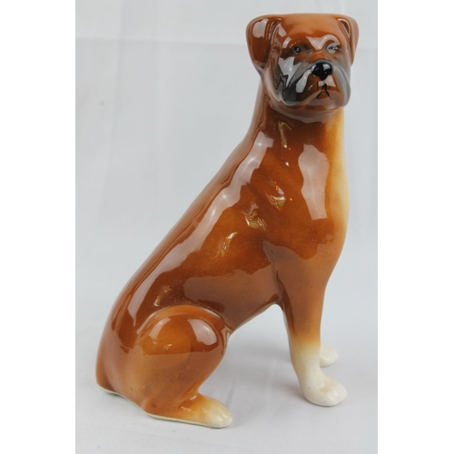 19 - Boxer Dog
A Ceramic Boxer Dog Figurine  Tan Colour Sitting On Haunches 20.5cm height