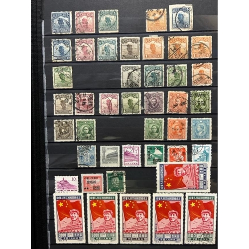 193 - China stockbook of various mainly 1950s packet material (dzns) (A)