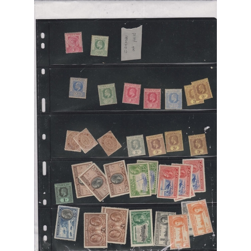 21 - British Commonwealth in huggies box, includes early Cayman on s/cards, 2 s/bks some Egyptian Postal ... 