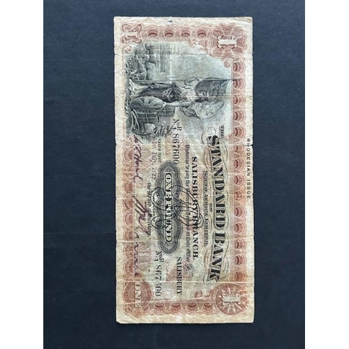 130 - Banknotes 1929 Standard Bank £1 Rhodesia issue rather worn & some tears VG (1) (S)